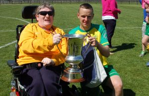 Lee pictured with supporter Sean Molloy after last season's league win