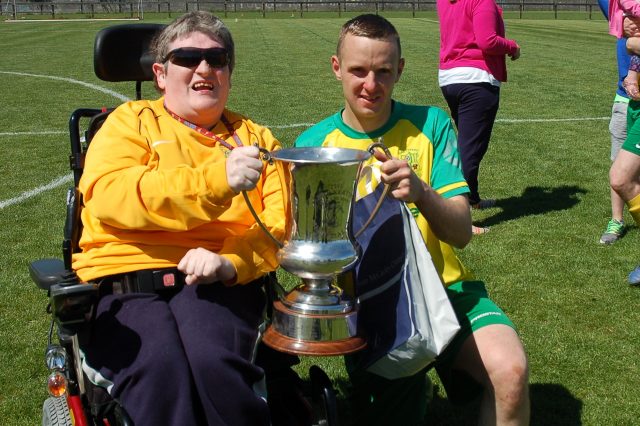 Lee pictured with supporter Sean Molloy after last season's league win