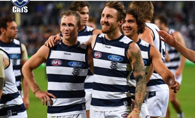 Zach Tuohy celebrates after his first Geelong game