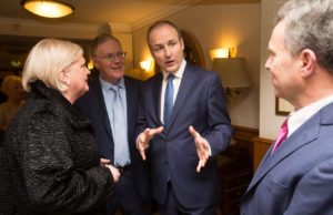 Fianna Fail leader Michael Martin chats to Sean Fleming at the party's dinner dance in the Castle Arms in Durrow