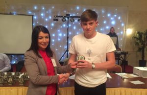 Shane Buggie of QRI winning third place in marketing at the PDST Get up and Go competition for TY Mini Company students in Kilkenny
