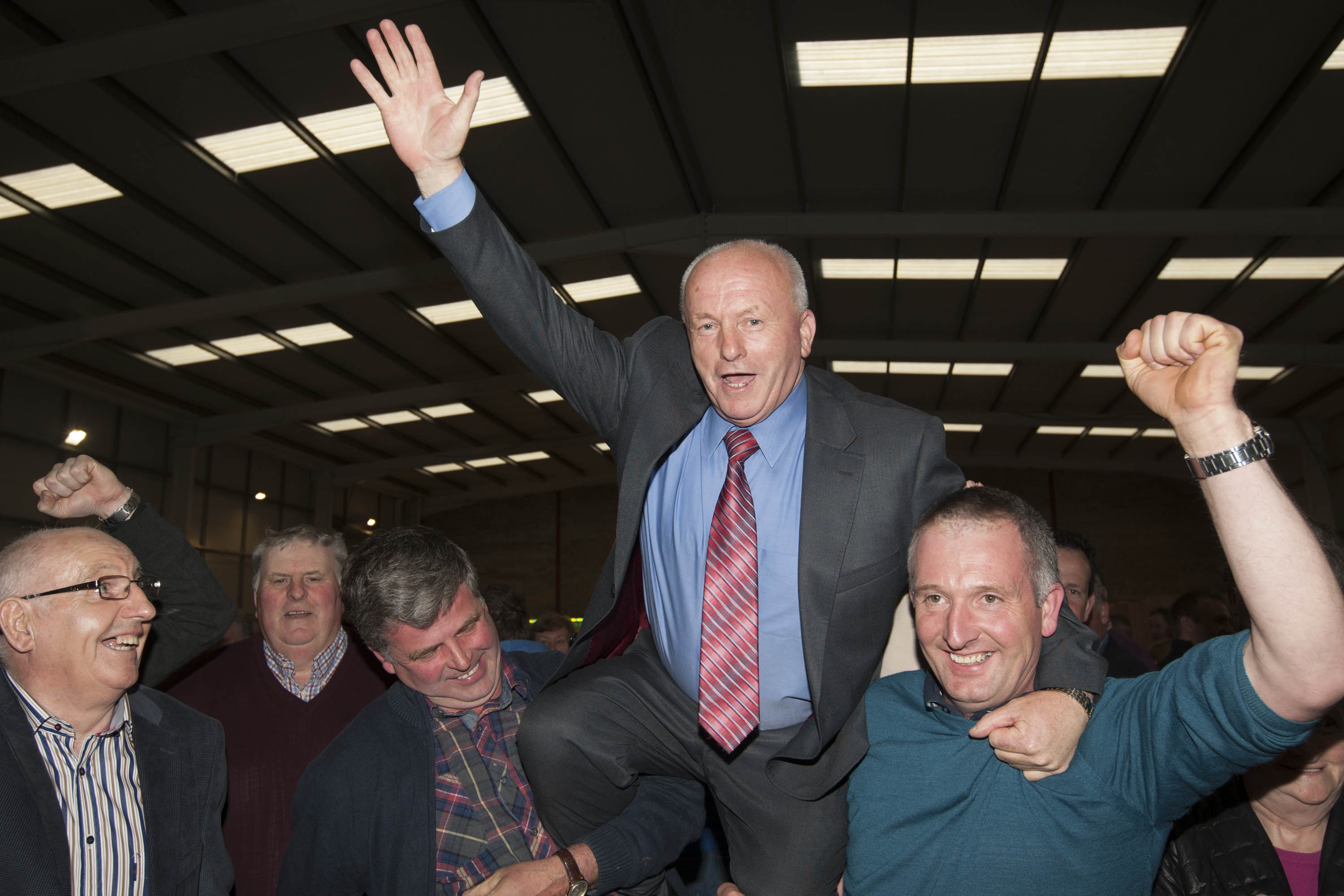 Celebrating his election at the 2014 count