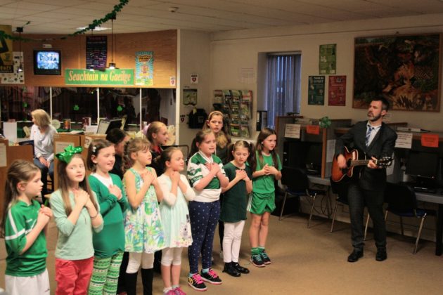 A group from Gaelscoil Phortlaoise with their teacher Muinteoir Dominic at a recent Irish night in Portlaoise library