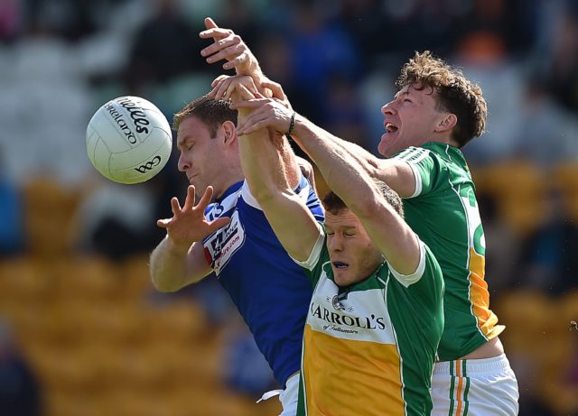 Donal Kingston in action against Shane Nally and James Lawlor in Laois's defeat