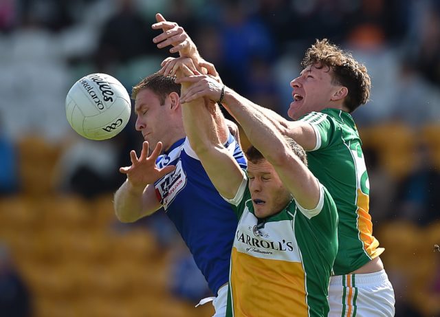 Donal Kingston in action against Shane Nally and James Lawlor in Laois's defeat