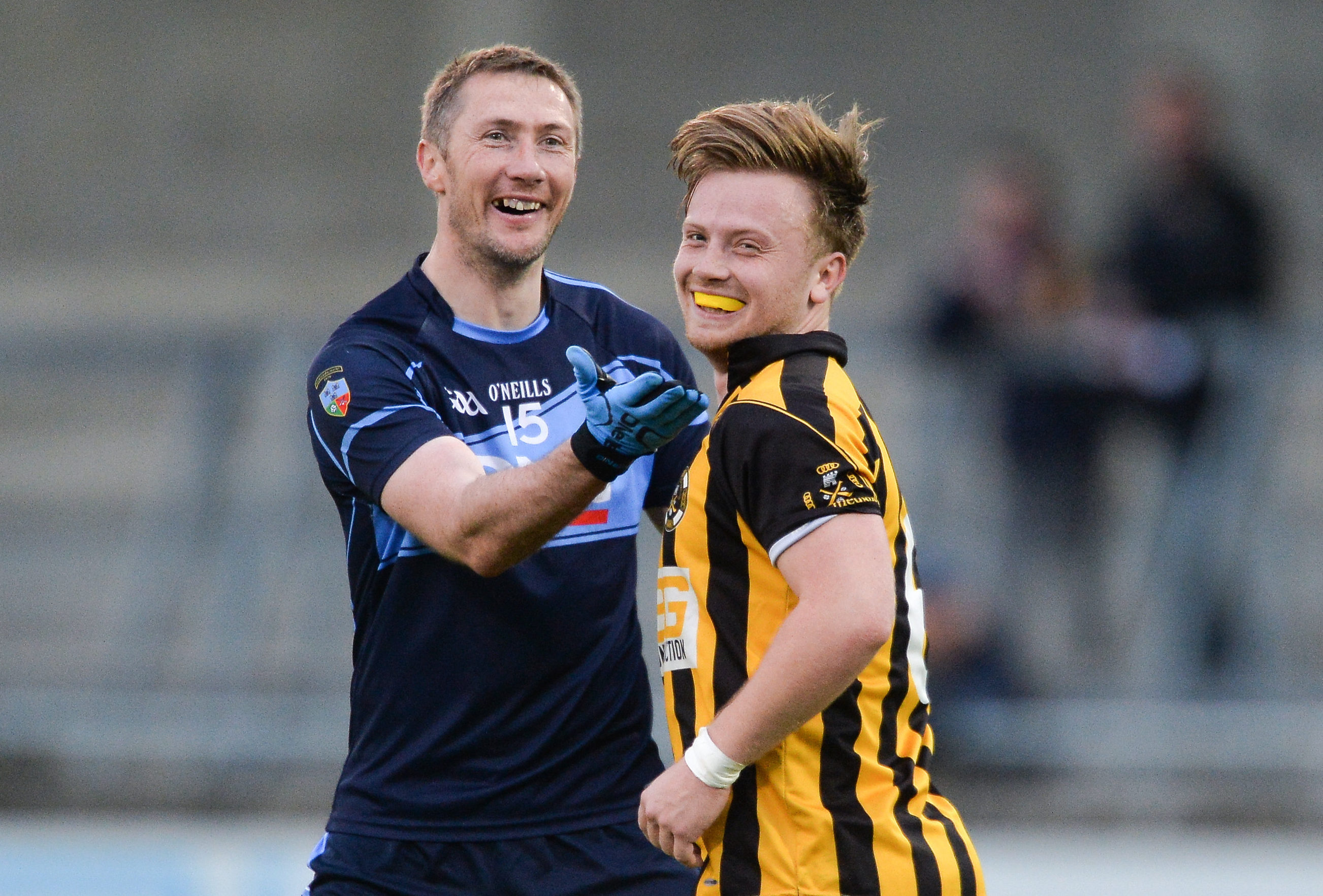 Billy Sheehan of St Jude's shares a joke with Jordan Briggs of Naomh Mearnóg during the Dublin County Senior Club Football Championship Round 1 match