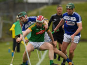 Cormac Reilly of Meath in action against Paddy Whelan and Willie Dunphy of Laois