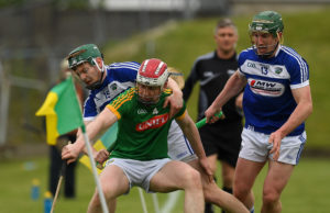 Cormac Reilly of Meath in action against Paddy Whelan and Willie Dunphy of Laois