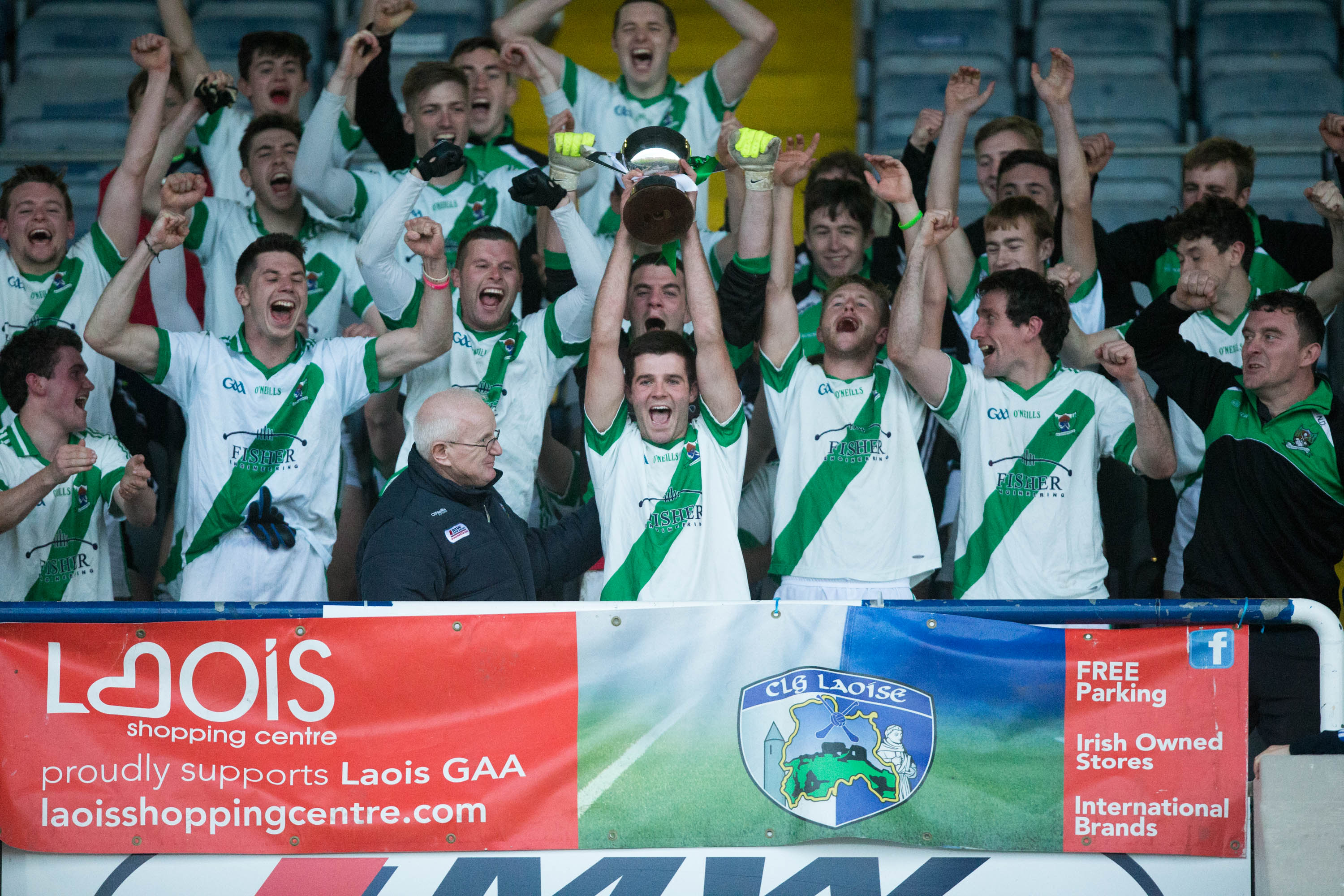 Rosenallis captain Cillian Callaly raises the trophy after defeating Park Ratheniska in the JFC Final at O'Moore Park. Picture: Alf Harvey/HRPhoto.ie