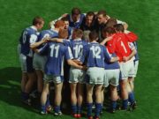 The Laois team pictured in a huddle before the match