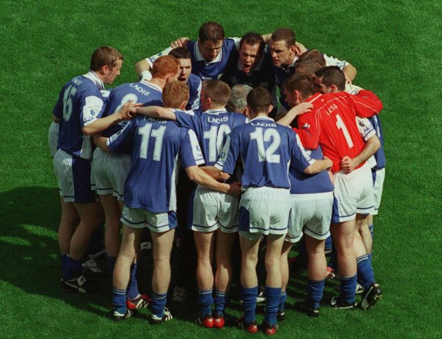 The Laois team pictured in a huddle before the match