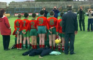 Behind the scenes, Castlecuffe N.S. line up for the cameras at the Cumann Na mBunscoil hurling and camogie finals at O'Moore Park some years ago