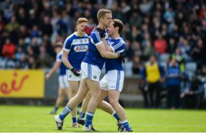 Paul Kingston celebrates with Pádraig McMahon after the first Laois goal