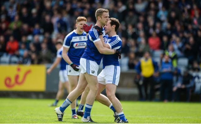 Paul Kingston celebrates with Pádraig McMahon after the first Laois goal