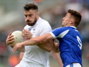 Fergal Conway in action against Colm Begley during the Leinster GAA Football Senior Championship Quarter-Final