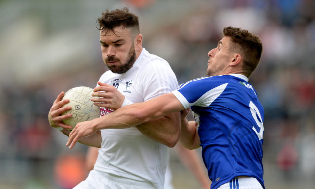 Fergal Conway in action against Colm Begley during the Leinster GAA Football Senior Championship Quarter-Final