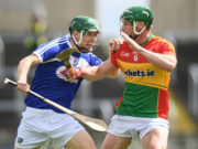 Sean Downey is tackled by David English of Carlow in todays game