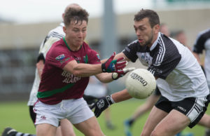 Jake Foster gets this pass away for Portarlington against Niall O'Rourke, Arles Killeen in the SFC at O'More Park. Picture: Alf Harvey/HRPhoto.ie