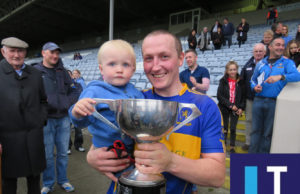 Peter O'Leary celebrates with his son after O'Dempsey's ACFL Division 1A win over St Joseph's