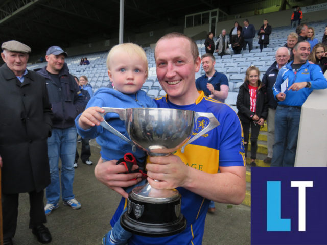 Peter O'Leary celebrates with his son after O'Dempsey's ACFL Division 1A win over St Joseph's