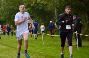 Competitors crossing the line at the Beat the Barge in Vicarstown