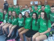 Nicole Turner, front, and Seán Scannell, back, with the rest of the Swim Ireland team at the UK Schools Swimming Championships