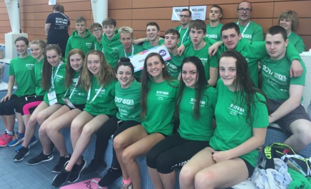 Nicole Turner, front, and Seán Scannell, back, with the rest of the Swim Ireland team at the UK Schools Swimming Championships