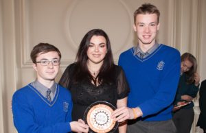 Patrick Kelly and Conor Doran with Teacher Teresa Egan collecting Knockbeg's award