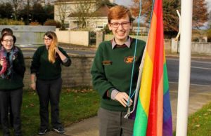 Prefect Amy Wall with the rainbow flag at St Fergals College Rathdowney