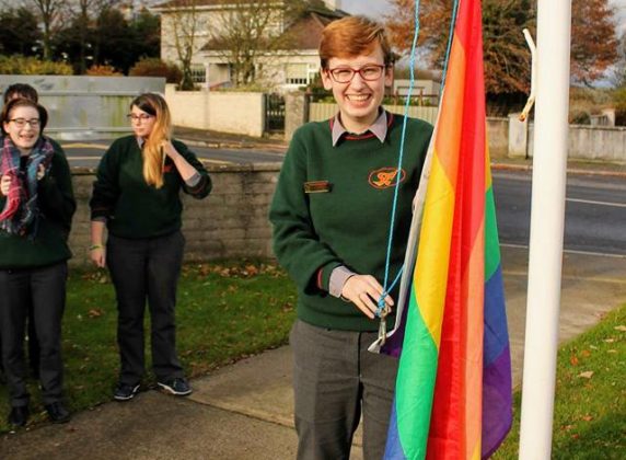 Prefect Amy Wall with the rainbow flag at St Fergals College Rathdowney