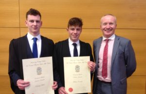 Padraig Burke and Emo's Finbarr Crowley who were presented with the UCD awards. Pictured with teacher Gerry Grealish