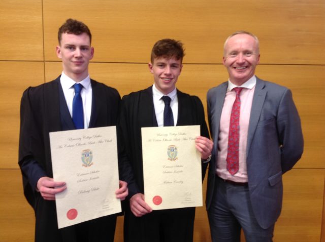 Padraig Burke and Emo's Finbarr Crowley who were presented with the UCD awards. Pictured with teacher Gerry Grealish