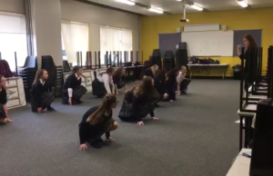 A shot of the Scoil Chriost Ri TY girls who are practicing for their for their musical