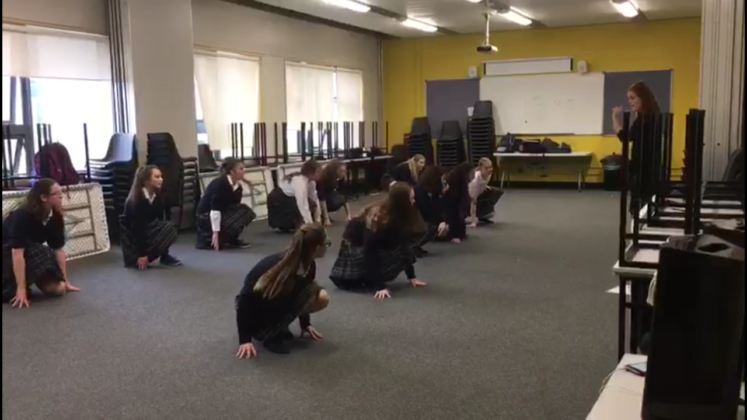 A shot of the Scoil Chriost Ri TY girls who are practicing for their for their musical