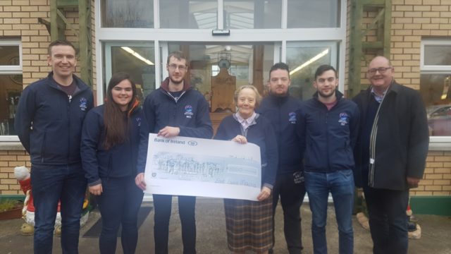 Members of the East Laois Macra present the cheque: Stephen George, Maeve Phelan, Murtagh Condron, Sr. Consilio, Kieran George, Peter Farrell, Liam McLoughlin to Sr. Consilio & Liam McLoughlin