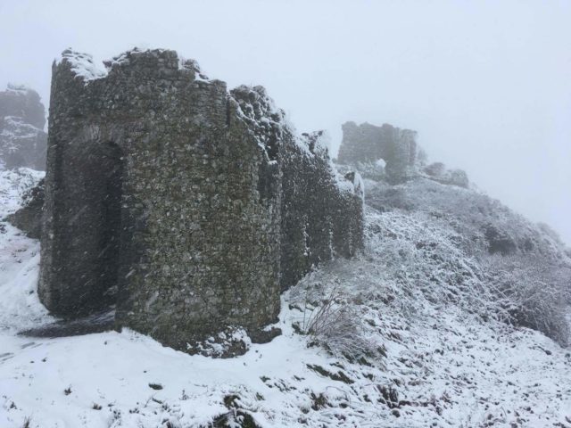 The Rock of Dunamase is glistening in snow
