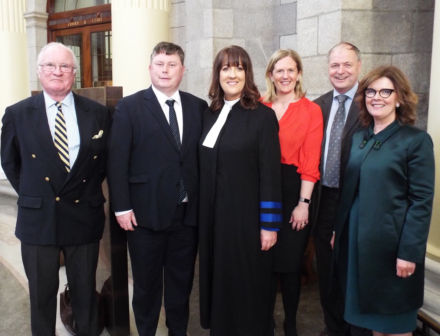 Judge Carthy is pictured with her former partners Patrick Reidy, Andrew Cody, Elaine Cox, Tome Stafford and Eva O'Brien