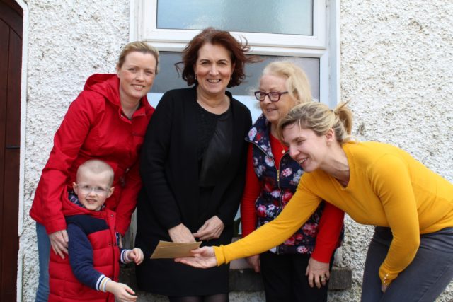 Teacher Orla Mulhare accepts a presentation from student Paul O’Brien. Also in pic are Janice Carthy, Ann Bergin Principal, and Mary Carthy.