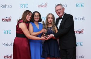 Evelyn O’Rourke (left) and Sean O’Rourke (right) present Colette Byrne and her daughter, Kate, with the Everyday Hero Award