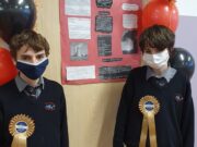 St Mary’s CBS students Sean Maher (navy mask) and Daniel Corbett (white mask) with their winning project