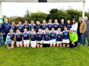 Portlaoise women's team and management celbrate winning promotion to Division 2 of the Leinster League with the defeat of Clontarf in Clondalkin on Saturday