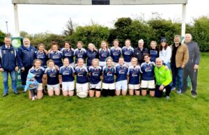 Portlaoise women's team and management celbrate winning promotion to Division 2 of the Leinster League with the defeat of Clontarf in Clondalkin on Saturday
