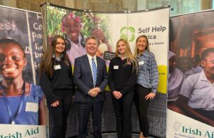 Sarah Phelan (r), Doireann O’Connor (l) and Tara Walsh with Min. Fleming in Iveagh House