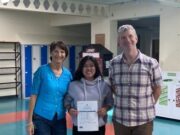 Katie Linh Roe with her proud parents Mags and Pat