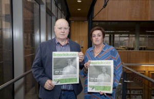 Tim and Marguerite Drennan holding up a copy of the Limerick Voice with a memorial of Joe featured on the cover. Picture: Alan Place