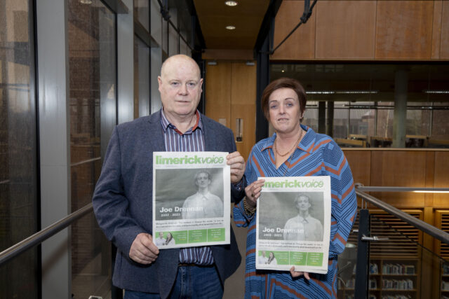 Tim and Marguerite Drennan holding up a copy of the Limerick Voice with a memorial of Joe featured on the cover. Picture: Alan Place